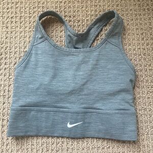 Nike sports bra. Tight fit and very supportive.